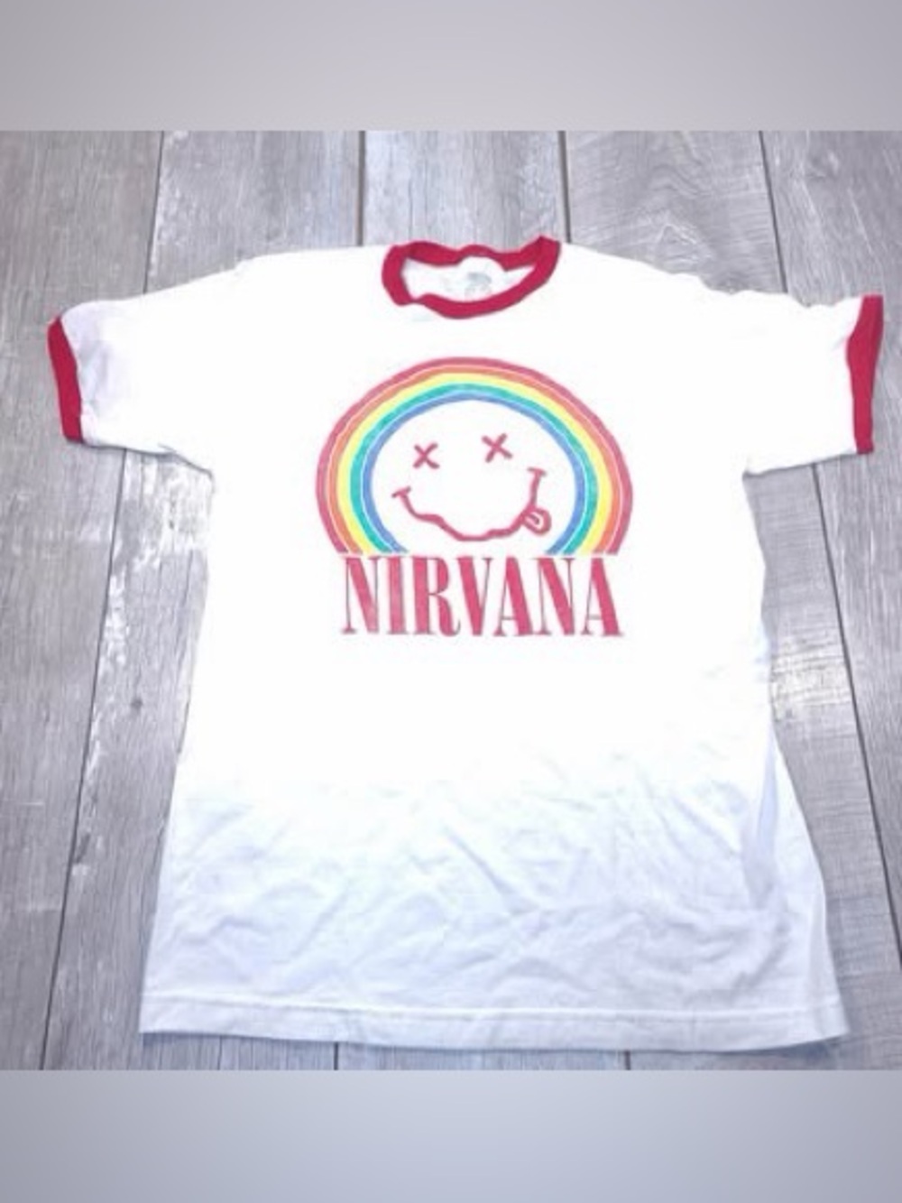 Nirvana rainbow happy face on white shirt. Red trim women’s Size medium